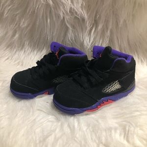 Black and purple Jordan’s